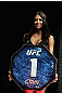 RIO DE JANEIRO, BRAZIL - JANUARY 14:  UFC Octagon Girl Arianny Celeste looks on during the Ricardo Funch versus Mike Pyle in a welterweight bout during UFC 142 at HSBC Arena on January 14, 2012 in Rio de Janeiro, Brazil.  (Photo by Josh Hedges/Zuffa LLC/Zuffa LLC via Getty Images)
