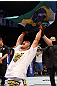 RIO DE JANEIRO, BRAZIL - JANUARY 14:  Thiago Tavares celebrates after defeating Sam Stout in a lightweight bout during UFC 142 at HSBC Arena on January 14, 2012 in Rio de Janeiro, Brazil.  (Photo by Josh Hedges/Zuffa LLC/Zuffa LLC via Getty Images)