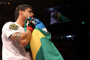 RIO DE JANEIRO, BRAZIL - JANUARY 14:  Thiago Tavares celebrates after defeating Sam Stout in a lightweight bout during UFC 142 at HSBC Arena on January 14, 2012 in Rio de Janeiro, Brazil.  (Photo by Josh Hedges/Zuffa LLC/Zuffa LLC via Getty Images)
