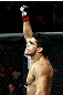 RIO DE JANEIRO, BRAZIL - JANUARY 14:  Thiago Tavares reacts against Sam Stout in a lightweight bout during UFC 142 at HSBC Arena on January 14, 2012 in Rio de Janeiro, Brazil.  (Photo by Josh Hedges/Zuffa LLC/Zuffa LLC via Getty Images)