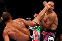 RIO DE JANEIRO, BRAZIL - JANUARY 14:  Edson Barboza (L) knocks out Terry Etim (R) with a spinning back kick in a lightweight bout during UFC 142 at HSBC Arena on January 14, 2012 in Rio de Janeiro, Brazil.  (Photo by Josh Hedges/Zuffa LLC/Zuffa LLC via Getty Images)