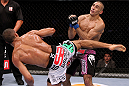 RIO DE JANEIRO, BRAZIL - JANUARY 14:  Edson Barboza (L) knocks out Terry Etim (R) with a spinning back kick in a lightweight bout during UFC 142 at HSBC Arena on January 14, 2012 in Rio de Janeiro, Brazil.  (Photo by Josh Hedges/Zuffa LLC/Zuffa LLC via Getty Images)