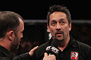 RIO DE JANEIRO, BRAZIL - JANUARY 14:  Referee Mario Yamasaki (R) explains his decision for calling the welterweight bout between Erick Silva and Carlo Prater during UFC 142 at HSBC Arena on January 14, 2012 in Rio de Janeiro, Brazil.  (Photo by Josh Hedges/Zuffa LLC/Zuffa LLC via Getty Images)