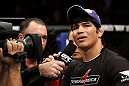 RIO DE JANEIRO, BRAZIL - JANUARY 14:  Erick Silva (R) reacts to referee Mario Yamasaki (not pictured) decision for calling the welterweight bout in favor of Carlo Prater during UFC 142 at HSBC Arena on January 14, 2012 in Rio de Janeiro, Brazil.  (Photo by Josh Hedges/Zuffa LLC/Zuffa LLC via Getty Images)