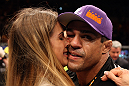 RIO DE JANEIRO, BRAZIL - JANUARY 14:  Joana Prado (L) kisses her husband Vitor Belfort (R) after he defeated Anthony Johnson (not pictured) in a middleweight bout during UFC 142 at HSBC Arena on January 14, 2012 in Rio de Janeiro, Brazil.  (Photo by Josh Hedges/Zuffa LLC/Zuffa LLC via Getty Images)