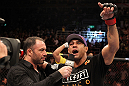 RIO DE JANEIRO, BRAZIL - JANUARY 14:  Vitor Belfort celebrates defeating Anthony Johnson (not pictured) in a middleweight bout during UFC 142 at HSBC Arena on January 14, 2012 in Rio de Janeiro, Brazil.  (Photo by Josh Hedges/Zuffa LLC/Zuffa LLC via Getty Images)