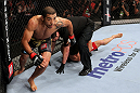 RIO DE JANEIRO, BRAZIL - JANUARY 14: Jose Aldo (L) celebrates after defeating Chad Mendes in a featherweight bout during UFC 142 at HSBC Arena on January 14, 2012 in Rio de Janeiro, Brazil.  (Photo by Josh Hedges/Zuffa LLC/Zuffa LLC via Getty Images)