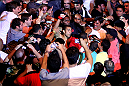 RIO DE JANEIRO, BRAZIL - JANUARY 14:  Jose Aldo (C) celebrates in the crowd after defeating Chad Mendes in a featherweight bout during UFC 142 at HSBC Arena on January 14, 2012 in Rio de Janeiro, Brazil.  (Photo by Josh Hedges/Zuffa LLC/Zuffa LLC via Getty Images)