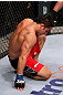 RIO DE JANEIRO, BRAZIL - JANUARY 14:  Chad Mendes tries to get up after losing to Jose Aldo in a featherweight bout during UFC 142 at HSBC Arena on January 14, 2012 in Rio de Janeiro, Brazil.  (Photo by Josh Hedges/Zuffa LLC/Zuffa LLC via Getty Images)