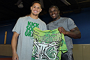 NASHVILLE, TN - JANUARY 18:  (L-R) Tennessee Titans defensive back Cortland Finnegan meets UFC fighter Melvin Guillard during the UFC on FX open workouts at the Nashville MMA Gym on January 18, 2012 in Nashville, Tennessee.  (Photo by Josh Hedges/Zuffa LLC/Zuffa LLC via Getty Images)