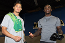 NASHVILLE, TN - JANUARY 18:  (L-R) Tennessee Titans defensive back Cortland Finnegan meets UFC fighter Melvin Guillard during the UFC on FX open workouts at the Nashville MMA Gym on January 18, 2012 in Nashville, Tennessee.  (Photo by Josh Hedges/Zuffa LLC/Zuffa LLC via Getty Images)