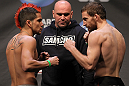 NASHVILLE, TN - JANUARY 19:  (L-R) Opponents Joseph Sandoval and Nick Denis face off after weighing in during the UFC on FX official weigh in at Bridgestone Arena on January 19, 2012 in Nashville, Tennessee.  (Photo by Josh Hedges/Zuffa LLC/Zuffa LLC via Getty Images)
