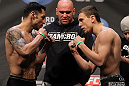 NASHVILLE, TN - JANUARY 19:  (L-R) Opponents Daniel Pineda and Pat Schilling face off after weighing in during the UFC on FX official weigh in at Bridgestone Arena on January 19, 2012 in Nashville, Tennessee.  (Photo by Josh Hedges/Zuffa LLC/Zuffa LLC via Getty Images)