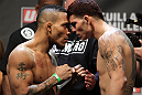 NASHVILLE, TN - JANUARY 19:  (L-R) Bantamweight opponents Mike Easton and Jared Papazian face off after weighing in during the UFC on FX official weigh in at Bridgestone Arena on January 19, 2012 in Nashville, Tennessee.  (Photo by Josh Hedges/Zuffa LLC/Zuffa LLC via Getty Images)
