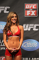 NASHVILLE, TN - JANUARY 19:  UFC Octagon Girl Brittney Palmer attends the UFC on FX official weigh in at Bridgestone Arena on January 19, 2012 in Nashville, Tennessee.  (Photo by Josh Hedges/Zuffa LLC/Zuffa LLC via Getty Images)