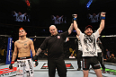NASHVILLE, TN - JANUARY 20:  Nick Denis (R) reacts after knocking out Joseph Sandoval during the UFC on FX event at Bridgestone Arena on January 20, 2012 in Nashville, Tennessee.  (Photo by Josh Hedges/Zuffa LLC/Zuffa LLC via Getty Images)