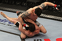 NASHVILLE, TN - JANUARY 20:  (R-L) Daniel Pineda punches Pat Schilling during the UFC on FX event at Bridgestone Arena on January 20, 2012 in Nashville, Tennessee.  (Photo by Josh Hedges/Zuffa LLC/Zuffa LLC via Getty Images)