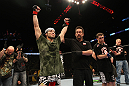 NASHVILLE, TN - JANUARY 20:  Daniel Pineda (L) reacts after defeating Pat Schilling during the UFC on FX event at Bridgestone Arena on January 20, 2012 in Nashville, Tennessee.  (Photo by Josh Hedges/Zuffa LLC/Zuffa LLC via Getty Images)