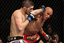 NASHVILLE, TN - JANUARY 20:  (L-R) Khabib Nurmagomedov and Kamal Shalorus trade punches during the UFC on FX event at Bridgestone Arena on January 20, 2012 in Nashville, Tennessee.  (Photo by Josh Hedges/Zuffa LLC/Zuffa LLC via Getty Images)