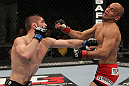 NASHVILLE, TN - JANUARY 20:  (L-R) Khabib Nurmagomedov punches Kamal Shalorus during the UFC on FX event at Bridgestone Arena on January 20, 2012 in Nashville, Tennessee.  (Photo by Josh Hedges/Zuffa LLC/Zuffa LLC via Getty Images)