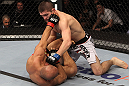 NASHVILLE, TN - JANUARY 20:  (R-L) Khabib Nurmagomedov punches Kamal Shalorus during the UFC on FX event at Bridgestone Arena on January 20, 2012 in Nashville, Tennessee.  (Photo by Josh Hedges/Zuffa LLC/Zuffa LLC via Getty Images)