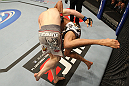 NASHVILLE, TN - JANUARY 20: (L-R) Eric Schafer takes down Jorge Rivera during the UFC on FX event at Bridgestone Arena on January 20, 2012 in Nashville, Tennessee. (Photo by Josh Hedges/Zuffa LLC/Zuffa LLC via Getty Images)