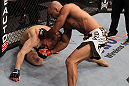 NASHVILLE, TN - JANUARY 20:  (R-L) Jorge Rivera punches Eric Schafer during the UFC on FX event at Bridgestone Arena on January 20, 2012 in Nashville, Tennessee.  (Photo by Josh Hedges/Zuffa LLC/Zuffa LLC via Getty Images)