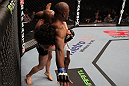 NASHVILLE, TN - JANUARY 20:  (L-R) Charlie Brenneman takes down Daniel Roberts during the UFC on FX event at Bridgestone Arena on January 20, 2012 in Nashville, Tennessee.  (Photo by Josh Hedges/Zuffa LLC/Zuffa LLC via Getty Images)