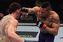 NASHVILLE, TN - JANUARY 20:  (R-L) Mike Easton punches Jared Papazian during the UFC on FX event at Bridgestone Arena on January 20, 2012 in Nashville, Tennessee.  (Photo by Josh Hedges/Zuffa LLC/Zuffa LLC via Getty Images)