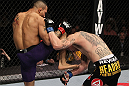 NASHVILLE, TN - JANUARY 20:  (L-R) Mike Easton delivers a knee against Jared Papazian during the UFC on FX event at Bridgestone Arena on January 20, 2012 in Nashville, Tennessee.  (Photo by Josh Hedges/Zuffa LLC/Zuffa LLC via Getty Images)