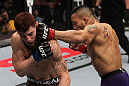 NASHVILLE, TN - JANUARY 20:  (R-L) Mike Easton punches Jared Papazian during the UFC on FX event at Bridgestone Arena on January 20, 2012 in Nashville, Tennessee.  (Photo by Josh Hedges/Zuffa LLC/Zuffa LLC via Getty Images)
