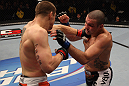 NASHVILLE, TN - JANUARY 20:  (L-R) Duane Ludwig punches Josh Neer during the UFC on FX event at Bridgestone Arena on January 20, 2012 in Nashville, Tennessee.  (Photo by Josh Hedges/Zuffa LLC/Zuffa LLC via Getty Images)