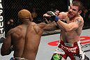 NASHVILLE, TN - JANUARY 20:  (L-R) Melvin Guillard punches Jim Miller during the UFC on FX event at Bridgestone Arena on January 20, 2012 in Nashville, Tennessee.  (Photo by Josh Hedges/Zuffa LLC/Zuffa LLC via Getty Images)
