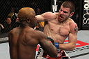 NASHVILLE, TN - JANUARY 20:  (R-L) Jim Miller punches Melvin Guillard during the UFC on FX event at Bridgestone Arena on January 20, 2012 in Nashville, Tennessee.  (Photo by Josh Hedges/Zuffa LLC/Zuffa LLC via Getty Images)