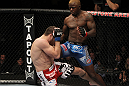 NASHVILLE, TN - JANUARY 20:  (R-L) Melvin Guillard delivers a knee strike against Jim Miller during the UFC on FX event at Bridgestone Arena on January 20, 2012 in Nashville, Tennessee.  (Photo by Josh Hedges/Zuffa LLC/Zuffa LLC via Getty Images)