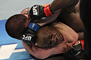 NASHVILLE, TN - JANUARY 20:  (L-R) Jim Miller secures a rear choke submission to defeat Melvin Guillard during the UFC on FX event at Bridgestone Arena on January 20, 2012 in Nashville, Tennessee.  (Photo by Josh Hedges/Zuffa LLC/Zuffa LLC via Getty Images)
