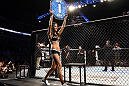 NASHVILLE, TN - JANUARY 20:  UFC Octagon Girl Arianny Celeste introduces round one before the Brenneman vs Roberts bout during the UFC on FX event at Bridgestone Arena on January 20, 2012 in Nashville, Tennessee.  (Photo by Josh Hedges/Zuffa LLC/Zuffa LLC via Getty Images)