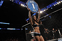 NASHVILLE, TN - JANUARY 20:  UFC Octagon Girl Arianny Celeste introduces round one before the Easton vs Papazian bout during the UFC on FX event at Bridgestone Arena on January 20, 2012 in Nashville, Tennessee.  (Photo by Josh Hedges/Zuffa LLC/Zuffa LLC via Getty Images)