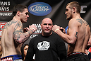CHICAGO, IL - JANUARY 27:  (L-R) Middleweight opponents Chris Camozzi and Dustin Jacoby face off after weighing in during the UFC on FOX official weigh in at the Chicago Theatre on January 27, 2012 in Chicago, Illinois.  (Photo by Josh Hedges/Zuffa LLC/Zuffa LLC via Getty Images) *** Local Caption *** Chris Camozzi; Dustin Jacoby; Dana White