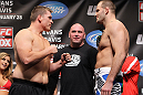 CHICAGO, IL - JANUARY 27:  (L-R) Heavyweight opponents Mike Russow and Jon-Olav Einemo face off after weighing in during the UFC on FOX official weigh in at the Chicago Theatre on January 27, 2012 in Chicago, Illinois.  (Photo by Josh Hedges/Zuffa LLC/Zuffa LLC via Getty Images) *** Local Caption *** Mike Russow; Jon-Olav Einemo; Dana White