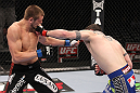 CHICAGO, IL - JANUARY 28:  (R-L) Chris Camozzi punches Dustin Jacoby during the UFC on FOX event at United Center on January 28, 2012 in Chicago, Illinois.  (Photo by Nick Laham/Zuffa LLC/Zuffa LLC via Getty Images) *** Local Caption *** Chris Camozzi; Dustin Jacoby