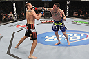 CHICAGO, IL - JANUARY 28:  (R-L) Chris Camozzi punches Dustin Jacoby during the UFC on FOX event at United Center on January 28, 2012 in Chicago, Illinois.  (Photo by Nick Laham/Zuffa LLC/Zuffa LLC via Getty Images) *** Local Caption *** Chris Camozzi; Dustin Jacoby