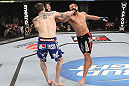 CHICAGO, IL - JANUARY 28:  (R-L) Dustin Jacoby and Chris Camozzi trade punches during the UFC on FOX event at United Center on January 28, 2012 in Chicago, Illinois.  (Photo by Nick Laham/Zuffa LLC/Zuffa LLC via Getty Images) *** Local Caption *** Chris Camozzi; Dustin Jacoby