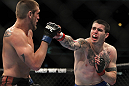 CHICAGO, IL - JANUARY 28:  (R-L) Chris Camozzi punches Dustin Jacoby during the UFC on FOX event at United Center on January 28, 2012 in Chicago, Illinois.  (Photo by Josh Hedges/Zuffa LLC/Zuffa LLC via Getty Images) *** Local Caption *** Chris Camozzi; Dustin Jacoby