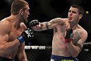 CHICAGO, IL - JANUARY 28:  (R-L) Chris Camozzi punches Dustin Jacoby during the UFC on FOX event at United Center on January 28, 2012 in Chicago, Illinois.  (Photo by Josh Hedges/Zuffa LLC/Zuffa LLC via Getty Images) *** Local Caption *** Chris Camozzi; Dustin Jacoby