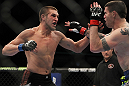 CHICAGO, IL - JANUARY 28:  (L-R) Dustin Jacoby punches Chris Camozzi during the UFC on FOX event at United Center on January 28, 2012 in Chicago, Illinois.  (Photo by Josh Hedges/Zuffa LLC/Zuffa LLC via Getty Images) *** Local Caption *** Chris Camozzi; Dustin Jacoby