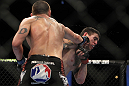 CHICAGO, IL - JANUARY 28:  (L-R) Dustin Jacoby punches Chris Camozzi during the UFC on FOX event at United Center on January 28, 2012 in Chicago, Illinois.  (Photo by Josh Hedges/Zuffa LLC/Zuffa LLC via Getty Images) *** Local Caption *** Chris Camozzi; Dustin Jacoby