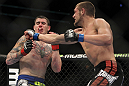 CHICAGO, IL - JANUARY 28:  (R-L) Dustin Jacoby punches Chris Camozzi during the UFC on FOX event at United Center on January 28, 2012 in Chicago, Illinois.  (Photo by Josh Hedges/Zuffa LLC/Zuffa LLC via Getty Images) *** Local Caption *** Chris Camozzi; Dustin Jacoby