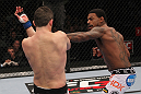 CHICAGO, IL - JANUARY 28:  (R-L) Michael Johnson punches Shane Roller during the UFC on FOX event at United Center on January 28, 2012 in Chicago, Illinois.  (Photo by Nick Laham/Zuffa LLC/Zuffa LLC via Getty Images) *** Local Caption *** Michael Johnson; Shane Roller