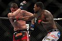 CHICAGO, IL - JANUARY 28:  (R-L) Michael Johnson punches Shane Roller during the UFC on FOX event at United Center on January 28, 2012 in Chicago, Illinois.  (Photo by Josh Hedges/Zuffa LLC/Zuffa LLC via Getty Images) *** Local Caption *** Michael Johnson; Shane Roller